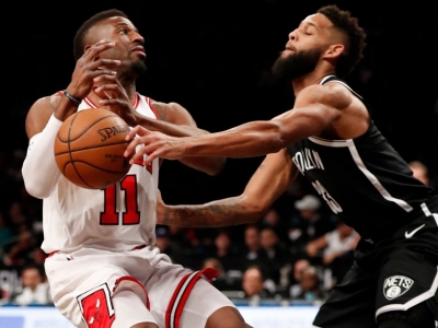 Brooklyn Nets guard Allen Crabbe forces Chicago Bulls guard David Nwaba to turn the ball over at the Barclays Center on April 9, 2018. The Nets defeated the Bulls 114-105.