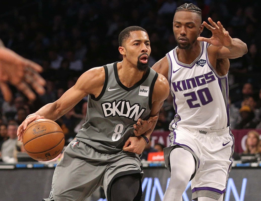 Brooklyn Nets guard Spencer Dinwiddie holds off Sacramento Kings forward Harry Giles III during an NBA basketball game at the Barclays Center on November 22, 2019. The Brooklyn Nets defeat the Sacramento Kings 116-97.  