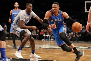 Brooklyn Nets rookie Caris Levert guarding Oklahoma City Thunder&#039;s Russell Westbrook during a game at the Barclays Center on March 14, 2017
