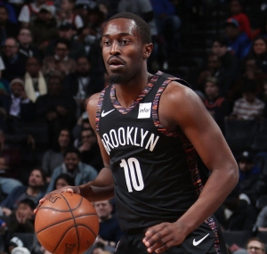 Brooklyn Nets guard Theo Pinson re-signs with the Nets.