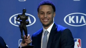 Golden State warriors guard Stephen Curry wins the NBA MVP award for a second consecutive year and is the first person to win with a unanimous vote