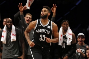 Brooklyn Nets shooting guard Allen Crabbe in front of the Nets’ bench. 