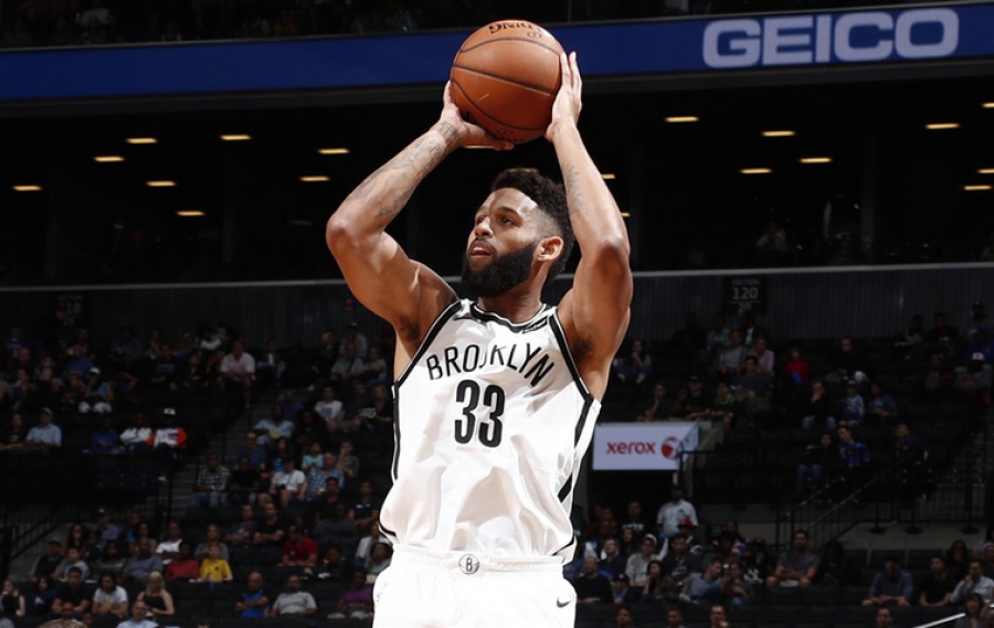 Brooklyn Nets guard/forward Allen Crabbe taking a jump shot in a game against the New York Knicks on Sunday, October 8, 2017. Crabbe scored 11 points in six minutes against the New York Knicks on Sunday.  