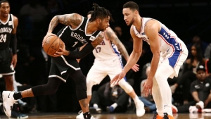 Brooklyn Nets guard, D’Angelo Russell moving past Philadelphia 76ers guard, Ben Simmons at the Barclays Center on Sunday, November 25, 2018.