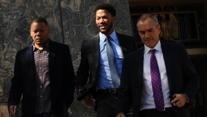 Derrick Rose (center) leaving court in Los Angeles after being found not liable in civil lawsuit for sexual assault 