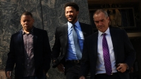 Derrick Rose (center) leaving court in Los Angeles after being found not liable in civil lawsuit for sexual assault 