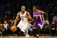 Brooklyn Nets Isaiah Whitehead dribbles past Sacramento's Darren Collison in game on November 27, 2016