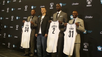 Photo from Left to Right: Paul Pierce, Mikhail Prokhorov, Brooklyn Nets Principal Owner; Kevin Garnett, and Jason Terry