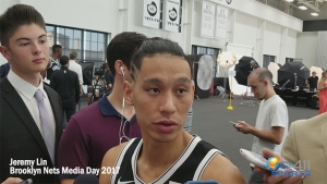 Jeremy Lin talking with media at Brooklyn Nets Media on September 25, 2017